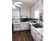 Bright and spacious kitchen with white cabinets, modern appliances, and ample counter space at 5582 Brady Dr, Stone Mountain, GA 30087