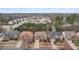 Aerial view of a well-planned residential neighborhood with tree-lined streets and manicured lawns at 2126 Roberts View Trl, Buford, GA 30519