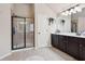 Bathroom features a glass enclosed shower and a white vanity with sink at 2126 Roberts View Trl, Buford, GA 30519
