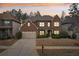 Charming brick two-story house with well-maintained front yard and attached two car garage at 2126 Roberts View Trl, Buford, GA 30519