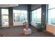 Relaxing common area with table, seating, and large windows offering natural light at 250 Pharr Ne Rd # 208, Atlanta, GA 30305