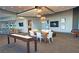 A luxury game room including billiards, shuffleboard, and a lounge area with multiple televisions at 250 Pharr Ne Rd # 208, Atlanta, GA 30305