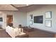 Relaxing lounge area with sleek furniture and a modern television setup, along with a snack and drink area at 250 Pharr Ne Rd # 208, Atlanta, GA 30305
