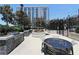 Enjoy outdoor dining with a built-in grill and seating area, perfect for entertaining with high-rise views at 250 Pharr Ne Rd # 208, Atlanta, GA 30305