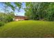 Large backyard with mature trees and a deck, perfect for outdoor entertaining and relaxation at 2521 Whites Mill Ln, Decatur, GA 30032