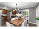 Open-concept dining room flowing into the kitchen and living area, ideal for gatherings and everyday living at 2521 Whites Mill Ln, Decatur, GA 30032