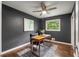 Home office boasts neutral decor with a large window and ceiling fan at 2521 Whites Mill Ln, Decatur, GA 30032