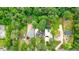 An aerial view of the property and the surrounding lush green landscape at 3734 Powers Ferry Nw Rd, Atlanta, GA 30342