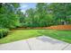 Expansive backyard with lush green lawn, offering ample space for recreation and relaxation at 3734 Powers Ferry Nw Rd, Atlanta, GA 30342