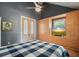 Relaxing bedroom with a built-in dresser, a queen-size bed, and unique decor touches at 3734 Powers Ferry Nw Rd, Atlanta, GA 30342