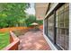 Beautiful wooden deck with backyard view, offering outdoor living space at 3734 Powers Ferry Nw Rd, Atlanta, GA 30342