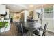 Open dining area near the kitchen, with natural light and stone flooring at 3734 Powers Ferry Nw Rd, Atlanta, GA 30342