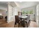 Formal dining room features hardwood floors, built-in shelving, and plenty of natural light at 3734 Powers Ferry Nw Rd, Atlanta, GA 30342