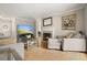 Inviting living room with a fireplace, hardwood floors, and plush seating for relaxation and entertainment at 3734 Powers Ferry Nw Rd, Atlanta, GA 30342