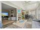 Bright living room featuring neutral furniture, an area rug and an open floor plan at 3734 Powers Ferry Nw Rd, Atlanta, GA 30342