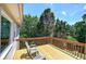 Wooden balcony features chairs and an outdoor view at 1124 Monarda Nw Way, Acworth, GA 30102
