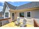 This balcony is accessible from inside the house and features chairs at 1124 Monarda Nw Way, Acworth, GA 30102