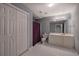 Bathroom featuring a toilet, shower, vanity, and tiled flooring at 1124 Monarda Nw Way, Acworth, GA 30102