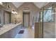 Neutral bathroom with double sink, soaking tub, and walk-in shower at 1124 Monarda Nw Way, Acworth, GA 30102