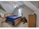 Bedroom featuring carpet, ceiling fan, closet, gray walls, and a comfortable bed at 1124 Monarda Nw Way, Acworth, GA 30102