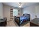 Bedroom featuring carpet, gray walls, and a comfortable bed at 1124 Monarda Nw Way, Acworth, GA 30102