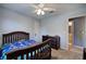 Bedroom featuring carpet, gray walls, and a comfortable bed at 1124 Monarda Nw Way, Acworth, GA 30102
