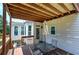 Cozy backyard deck with a table, chairs, and view of the backyard at 1124 Monarda Nw Way, Acworth, GA 30102