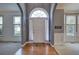 Bright entryway with hardwood floors, archways, and ample natural light at 1124 Monarda Nw Way, Acworth, GA 30102