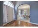 Inviting entryway with hardwood floors, archway, and view into the dining room at 1124 Monarda Nw Way, Acworth, GA 30102