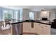 Bright kitchen features black countertops, stainless steel dishwasher, and breakfast nook at 1124 Monarda Nw Way, Acworth, GA 30102