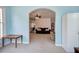 Open concept living room offers a cozy sitting area and an adjacent view into another room at 1124 Monarda Nw Way, Acworth, GA 30102