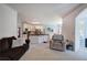 Open concept living room offers a cozy sitting area and an adjacent view of the eat-in kitchen at 1124 Monarda Nw Way, Acworth, GA 30102