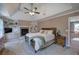 Spacious main bedroom features tray ceilings, a fireplace, and built-in shelving at 1124 Monarda Nw Way, Acworth, GA 30102