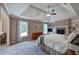 Spacious main bedroom boasts a fireplace, sitting area, built in shelves, and large windows at 1124 Monarda Nw Way, Acworth, GA 30102