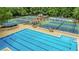 Community swimming pool with multiple lanes for swimming and plenty of space for lounge chairs at 1124 Monarda Nw Way, Acworth, GA 30102