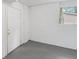 Unfinished basement with white-painted walls and cement floor at 2358 Dabney Ter, East Point, GA 30344