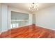 Bedroom with hardwood floors and view of the lower level at 4400 Old Allgood Cir, Stone Mountain, GA 30083