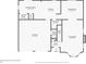 Layout of floor 1 featuring a kitchen, dining room, living room, laundry room, and garage at 4400 Old Allgood Cir, Stone Mountain, GA 30083
