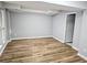 Updated room with wood floors and neutral paint is ready for furniture at 5025 Highland Club Dr, Marietta, GA 30068