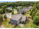 Aerial view showcasing the home's backyard, green space, and surrounding neighborhood at 1045 Fords Crossing Nw Dr, Acworth, GA 30101