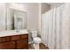 Well-lit bathroom with a shower and vanity at 1045 Fords Crossing Nw Dr, Acworth, GA 30101