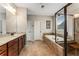 Bathroom featuring a soaking tub, a glass shower, and granite countertops at 1045 Fords Crossing Nw Dr, Acworth, GA 30101