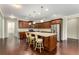 Gourmet kitchen featuring granite countertops, stainless steel appliances, and a spacious island with seating at 1045 Fords Crossing Nw Dr, Acworth, GA 30101