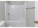 Neat bathroom highlighting the white shower-tub with a convenient towel rack and a shower head at 1685 Great Oaks Dr, Lawrenceville, GA 30045