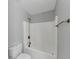 Bright bathroom showcasing a clean white tub with updated shower fixtures at 1685 Great Oaks Dr, Lawrenceville, GA 30045