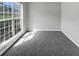 Bright bedroom with large window and neutral carpet, creating a cozy atmosphere at 1685 Great Oaks Dr, Lawrenceville, GA 30045