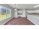 Eat-in dining area featuring white trim, large window and view into the kitchen at 1685 Great Oaks Dr, Lawrenceville, GA 30045