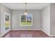 Eat-in dining area featuring walk-out access and a large backyard view at 1685 Great Oaks Dr, Lawrenceville, GA 30045