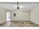 Spacious, unfinished garage featuring an open doorway to the home's interior at 1685 Great Oaks Dr, Lawrenceville, GA 30045