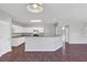 Modern kitchen featuring white cabinets, granite countertops and stainless steel appliances at 1685 Great Oaks Dr, Lawrenceville, GA 30045